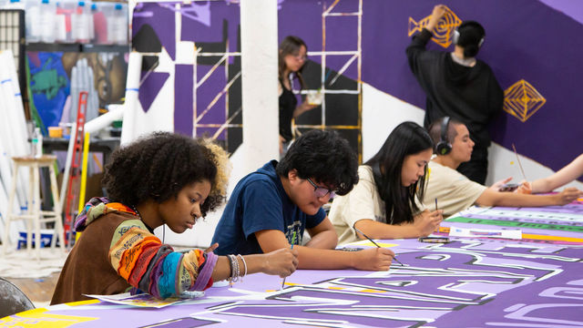 SLI artists working in the studio 