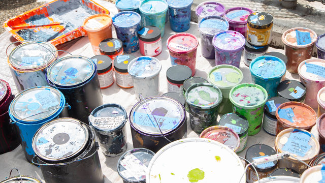 Various colored paint buckets