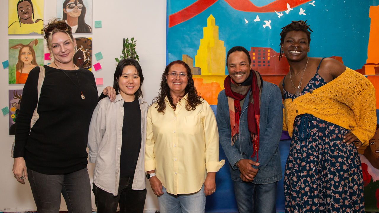 Group photo of executive director with teachers 