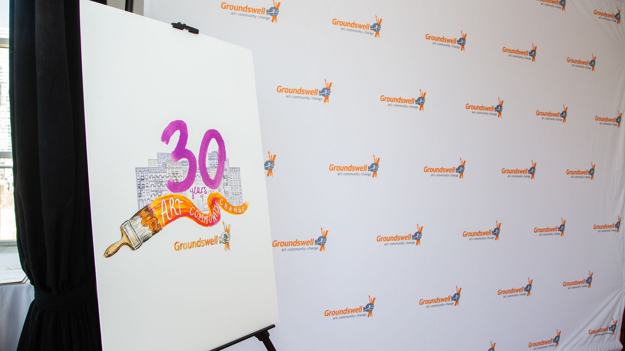 Groundswell 30th anniversary sign and a Groundswell step and repeat