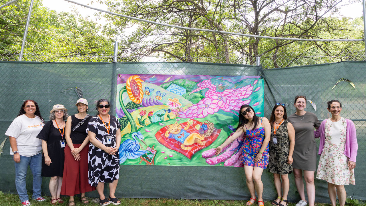 Group photos in front of finished mural