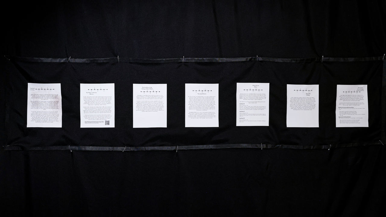 Documents hanging in exhibition